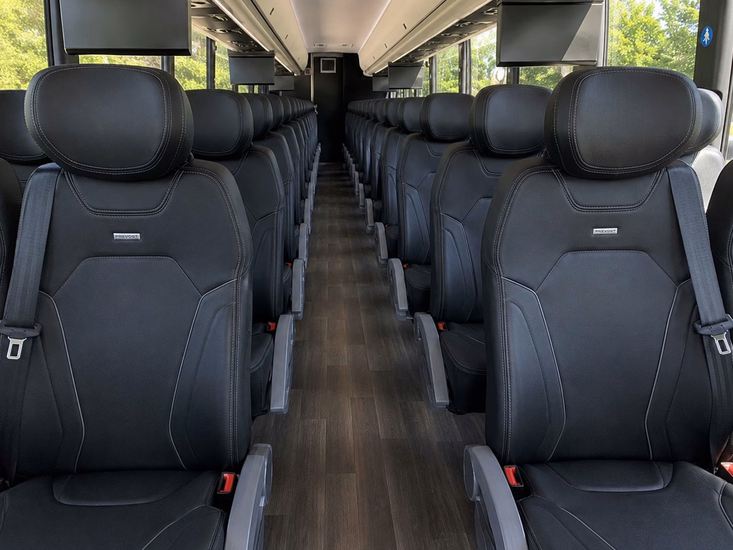 how bus type changes charter bus prices in lansing michigan