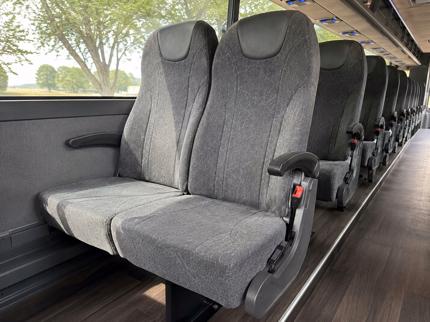 how trip distance and duration affect lansing charter bus rates