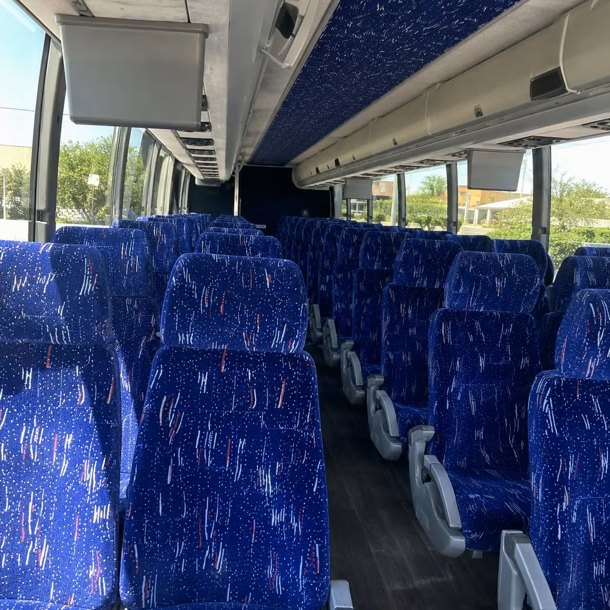 long distance game day charter bus rentals from lansing to detroit ann arbor and beyond